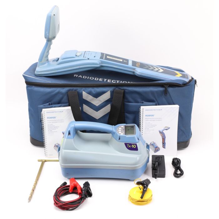 Radiodetection RD8100 cable and pipe locator unit with transmitter, direct connection leads, induction clamp, earth stake, and AA batteries. A high-performance device designed for locating underground utilities with advanced signal processing and multiple