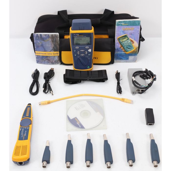 An image of the FLUKE NETWORKS Cable Tester Kit: CableIQ, a handheld device used to test and troubleshoot Ethernet and coaxial cables. The device features a large color display screen, buttons for navigation and selection, and various ports and connectors